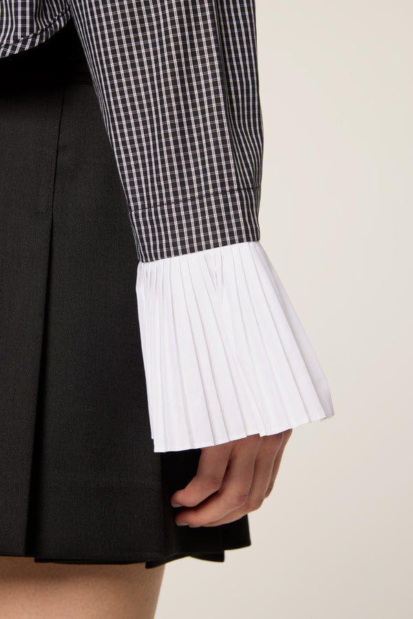 Shirt with pleated cuffs