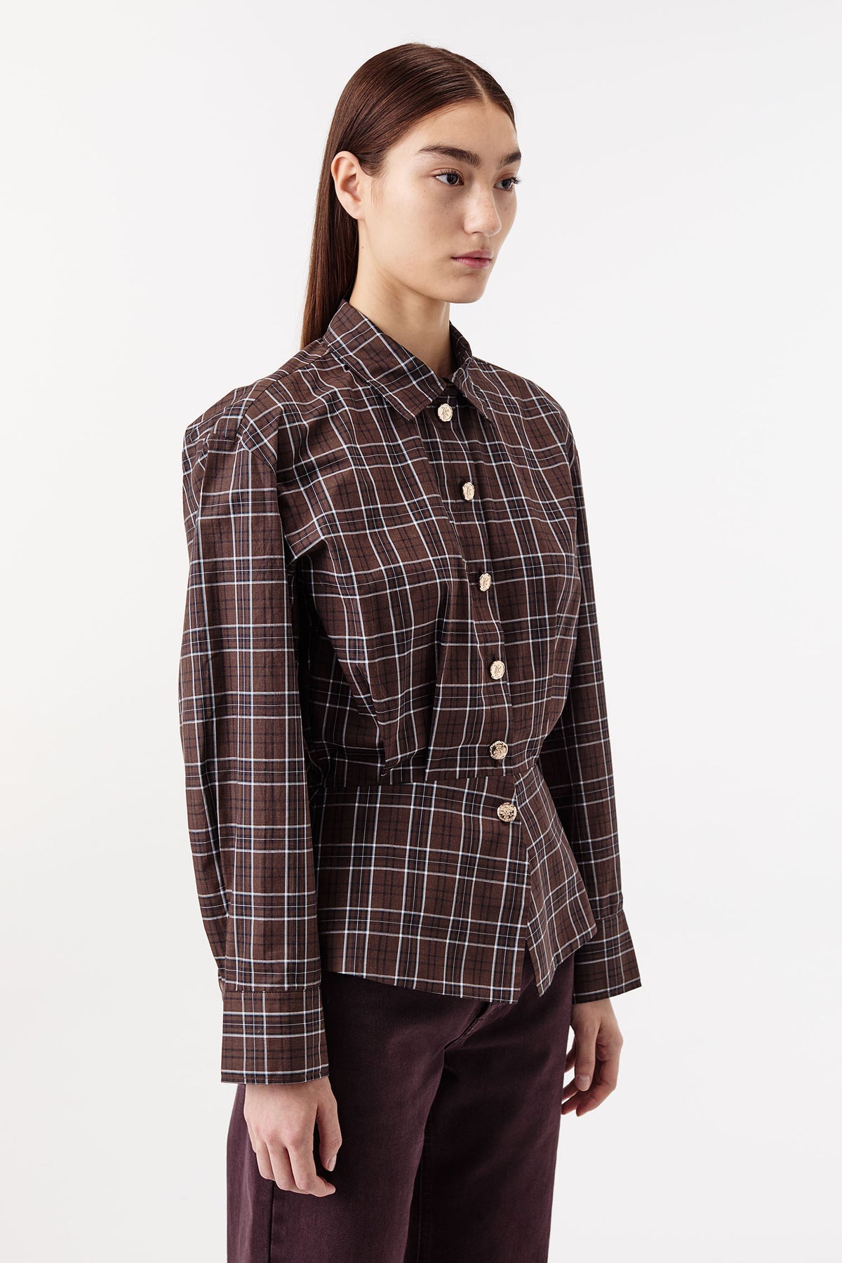 Chemise à carreaux et boutons dorés