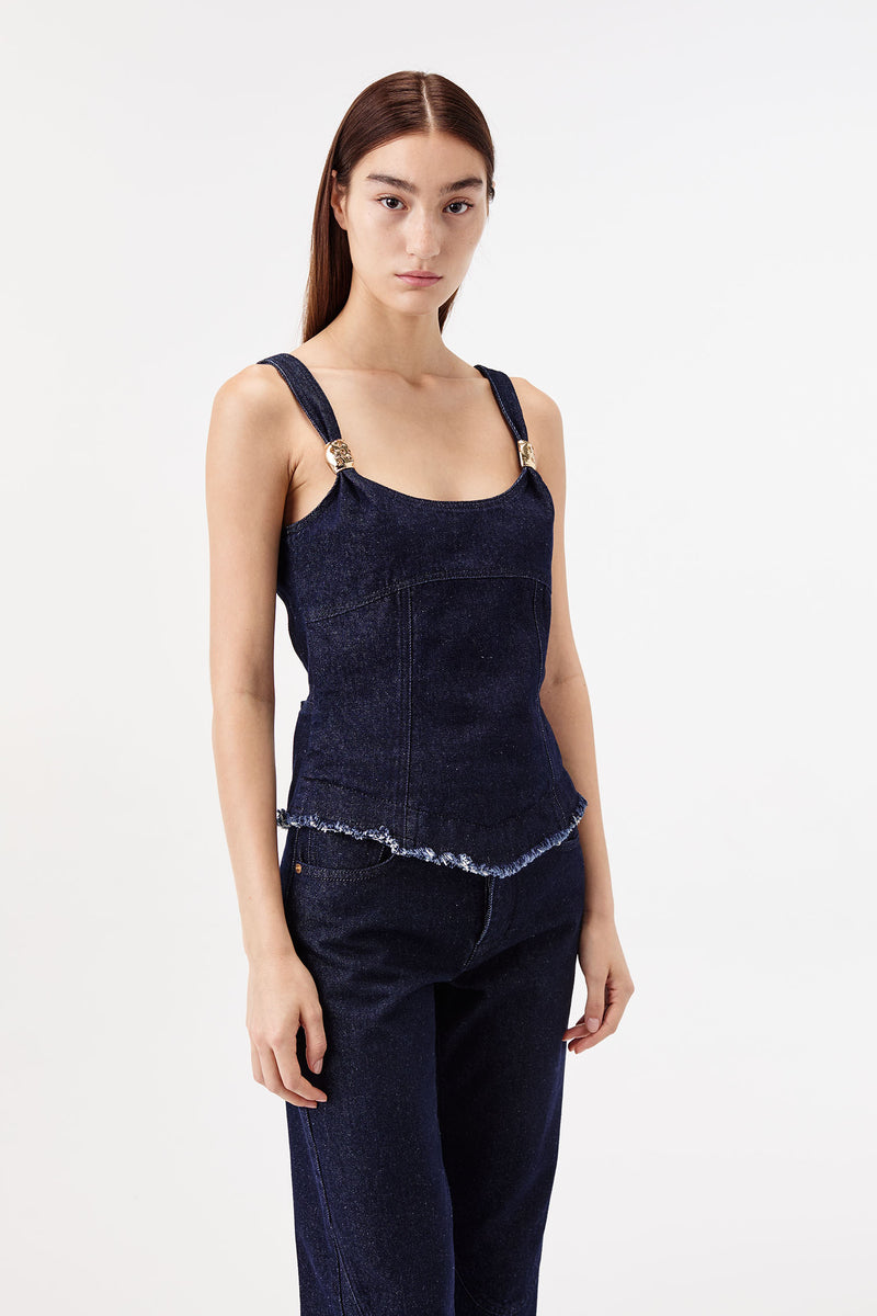 Denim top with gold jewelry details