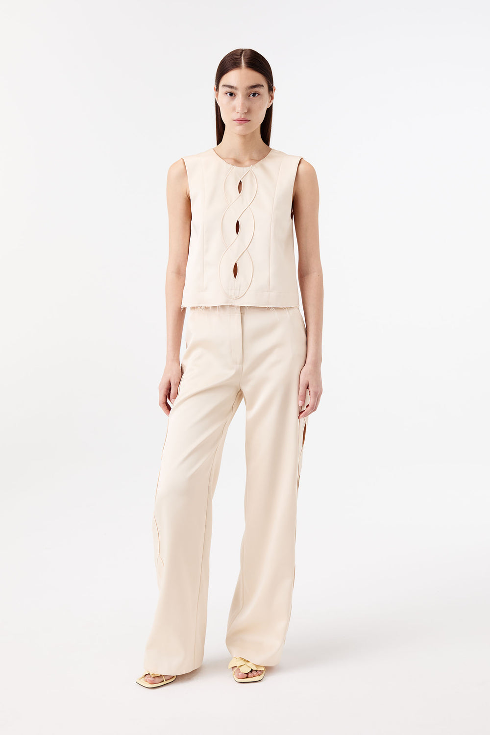 Satin top with a braided opening