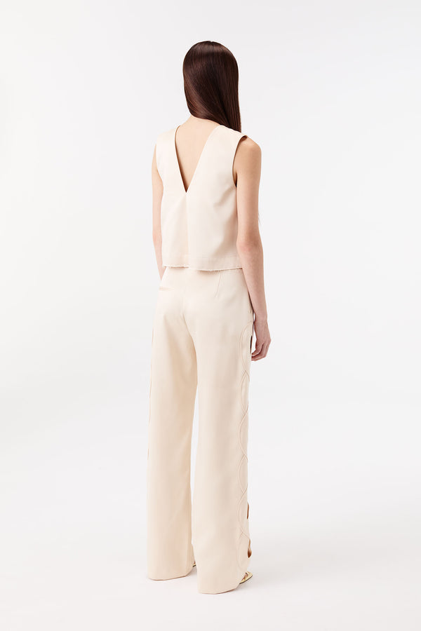 Satin pants with a braided opening