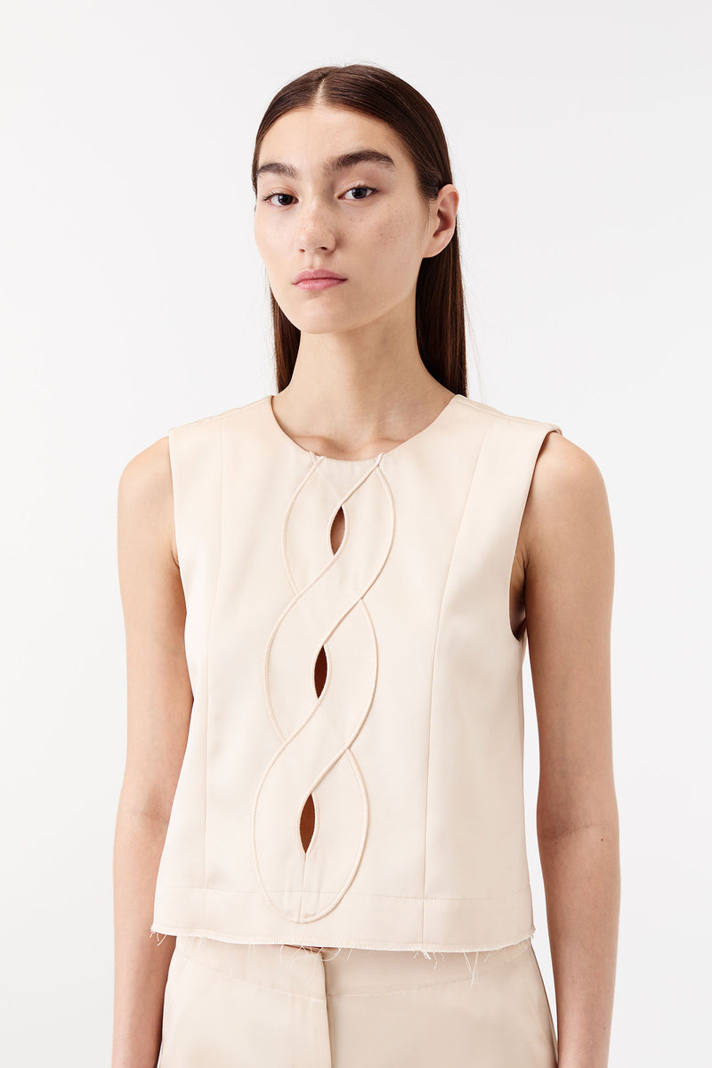 Satin top with a braided opening