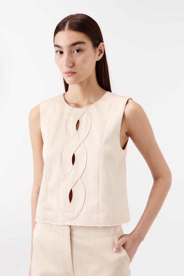 Satin top with a braided opening