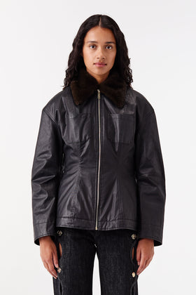 Waxed canvas jacket with fur collar