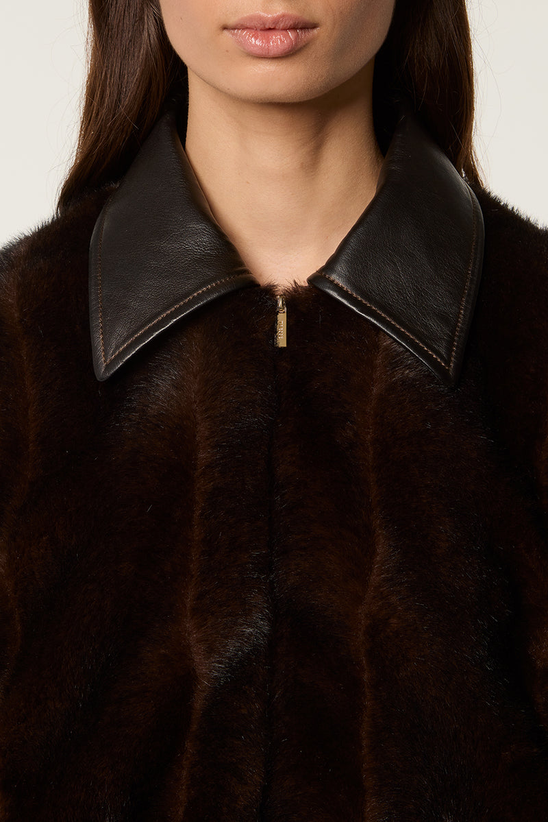 Fur with leather collar