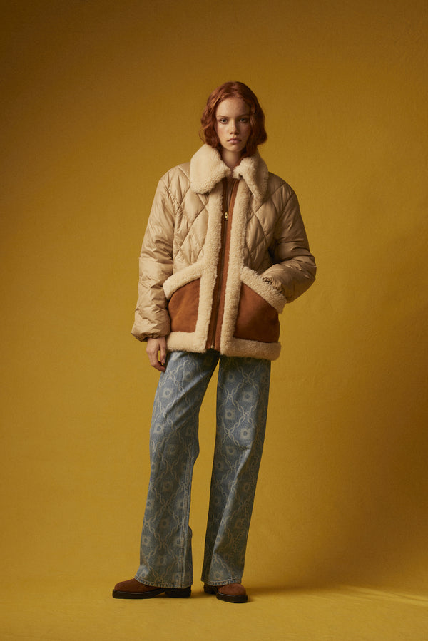 Quilted down jacket with shearling details