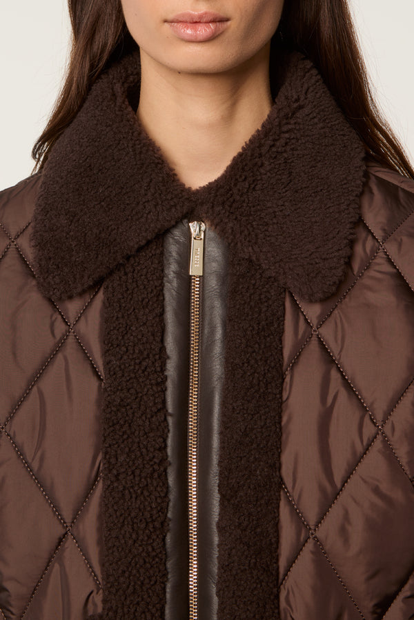 Quilted down jacket