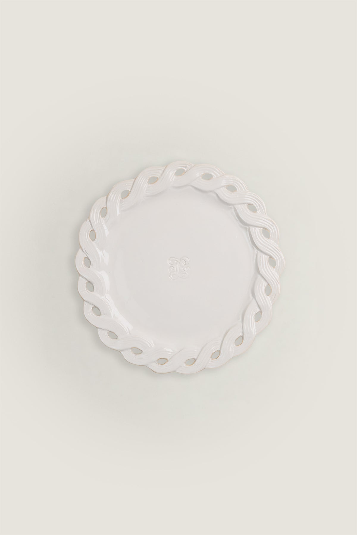 Piatto da cena con bordi tresse