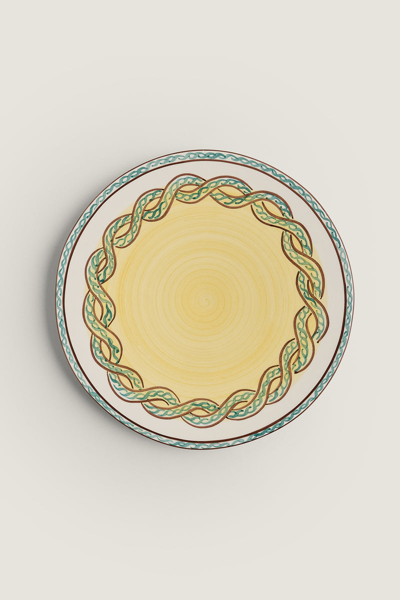 Dinner plate with braided pattern