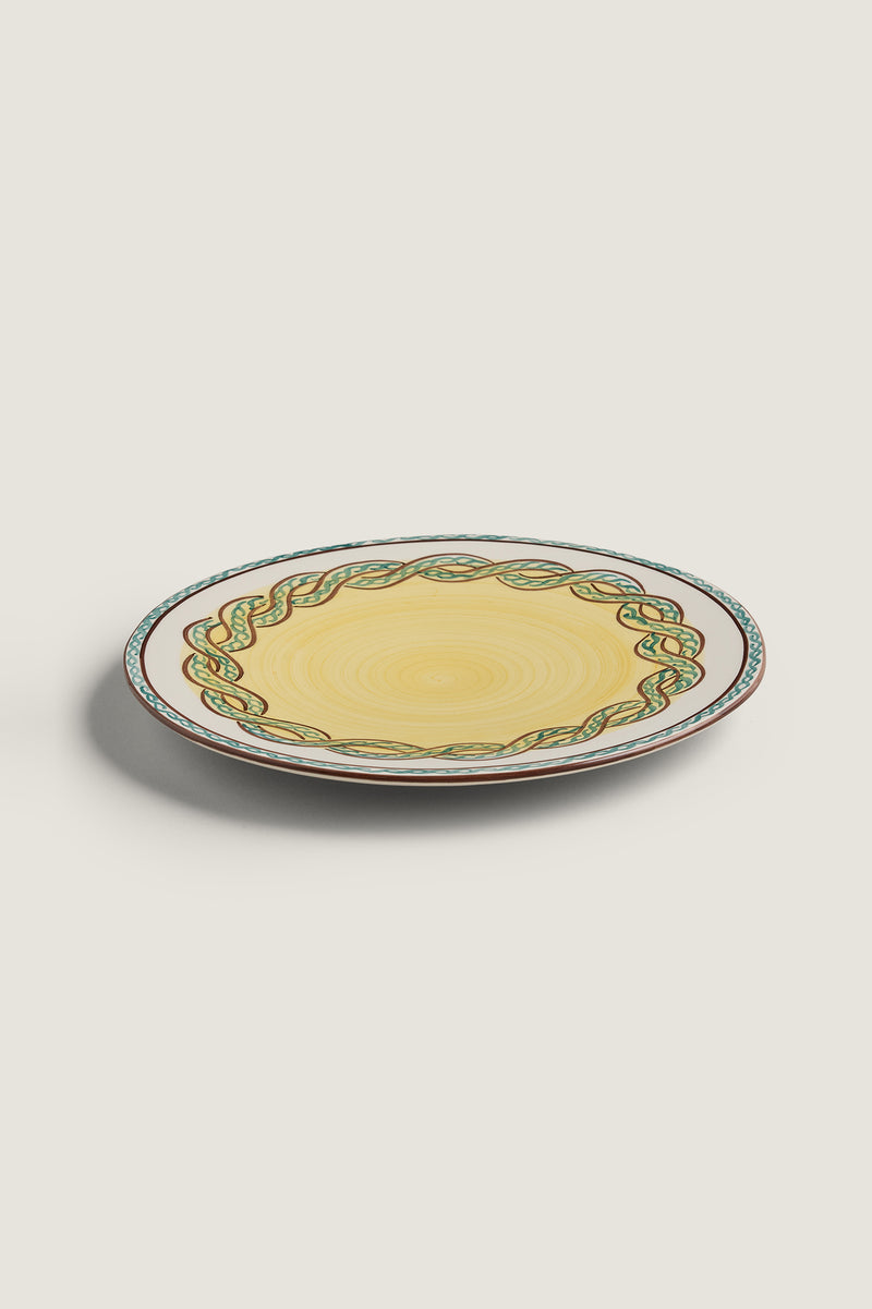 Dinner plate with braided pattern