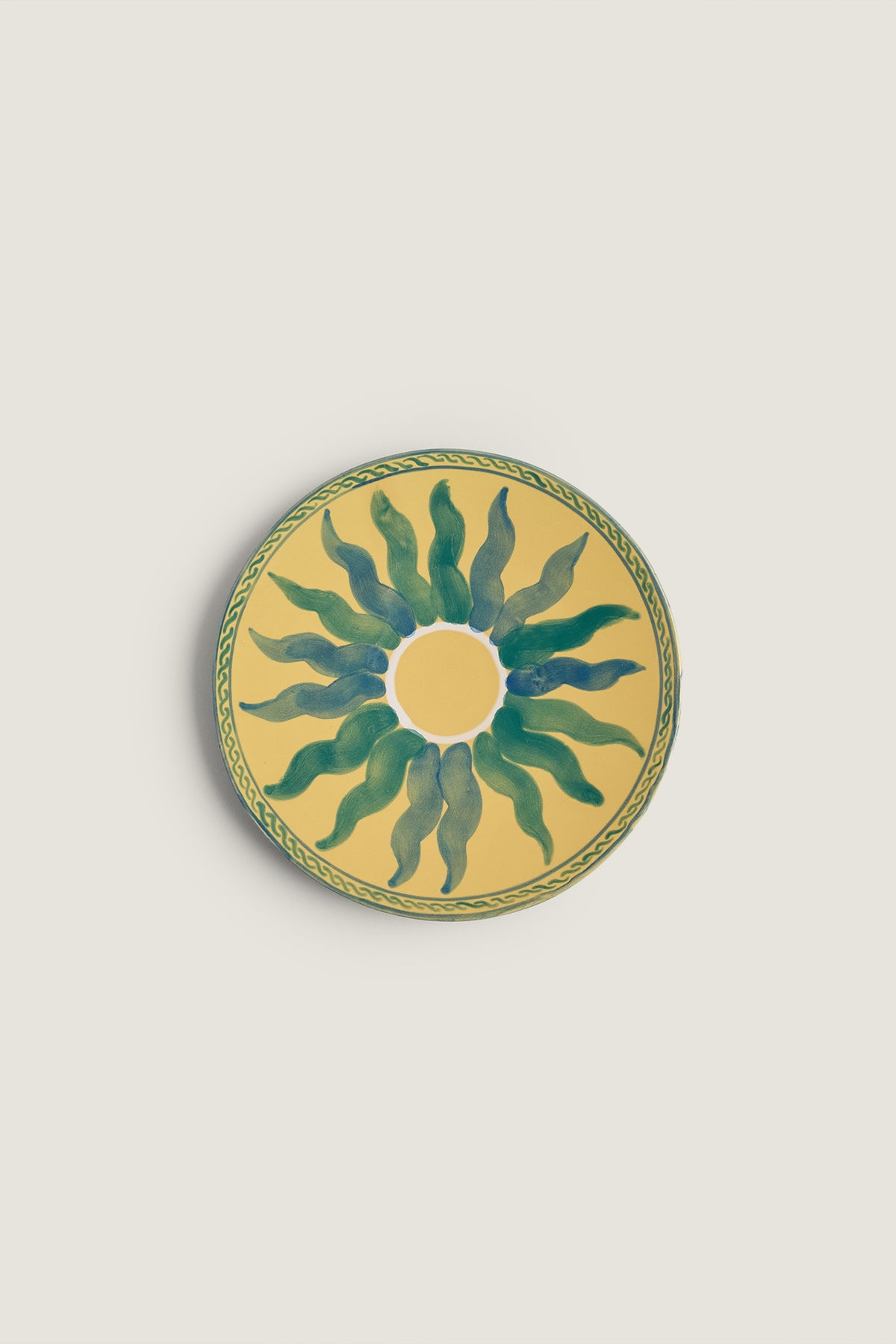 Dessertteller mit Sonnenmotiv