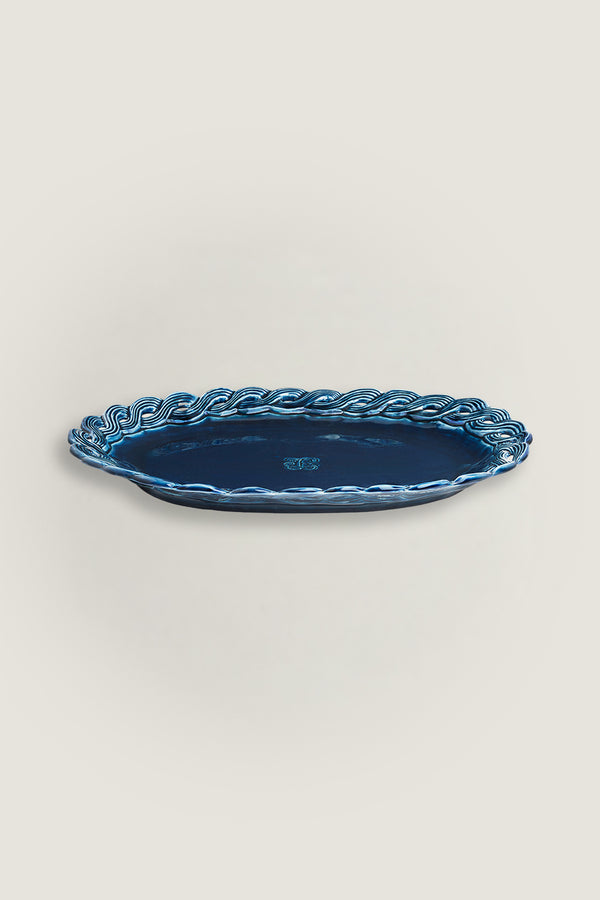 Ceramic dish with braided edges