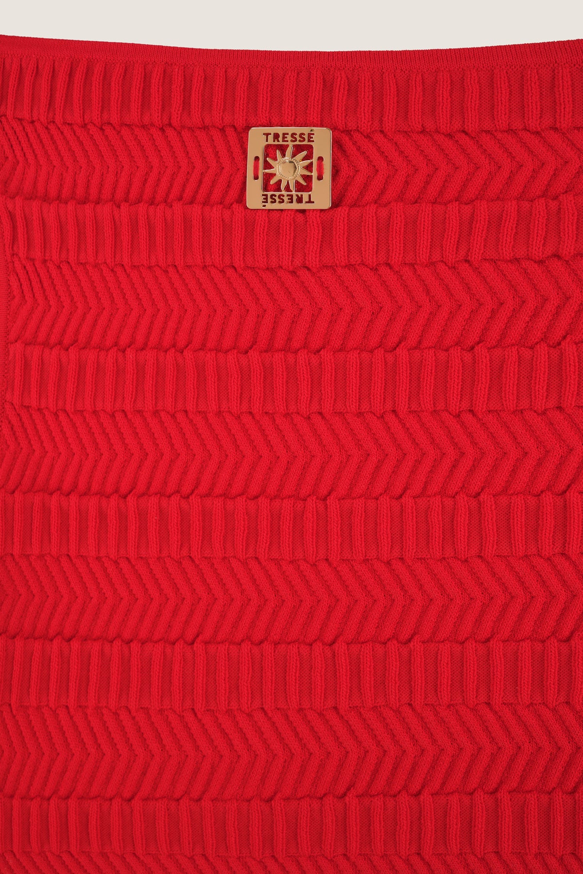 Stricktop mit quadratischem Golddetail