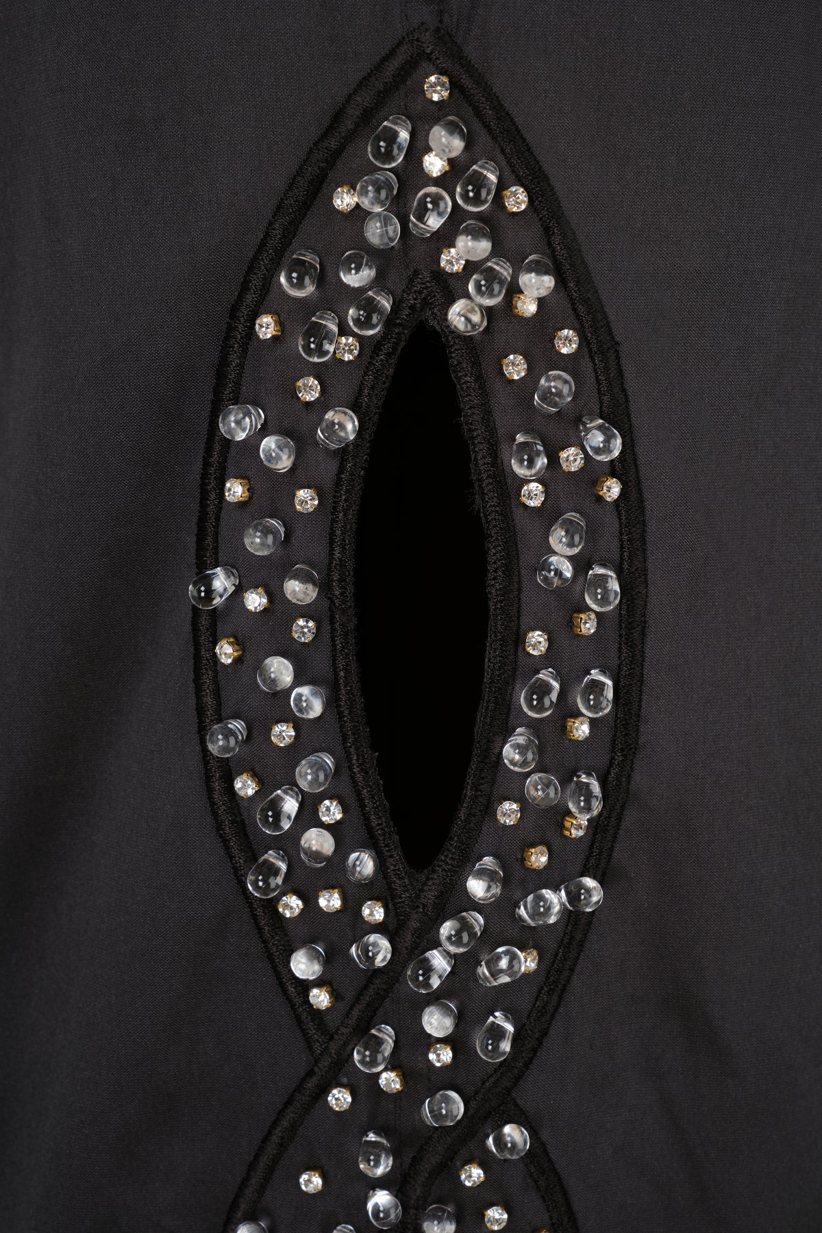 Trousers with rhinestone-embroidered braids