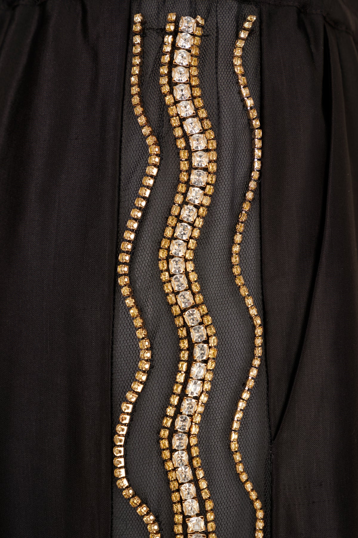 Pants with embroidered rhinestones