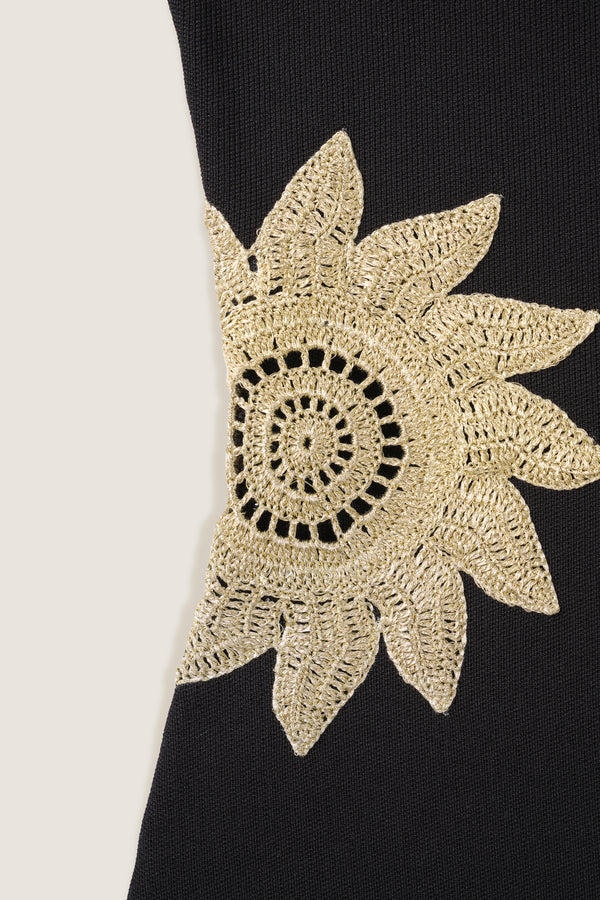 Short knit dress with openwork sunburst detailing