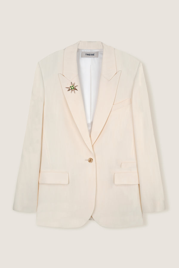 Tailored jacket with palm brooch