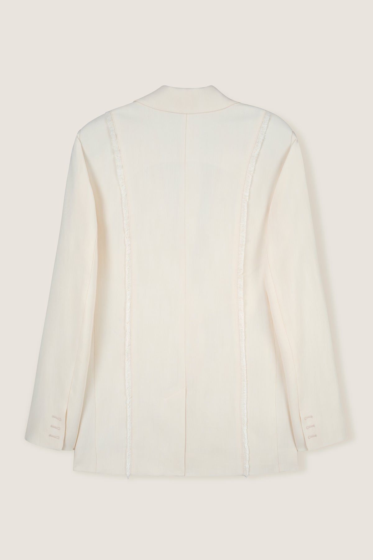 Giacca sartoriale con spilla sole