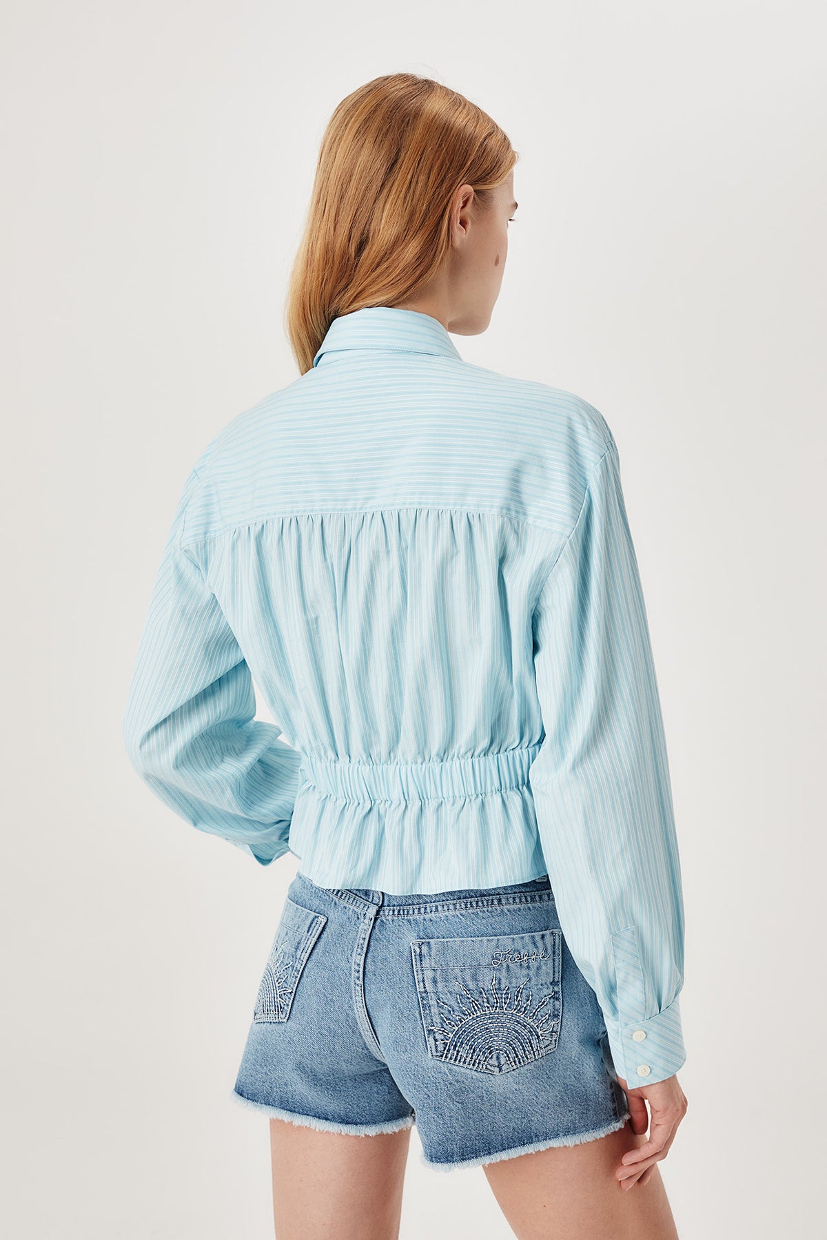 Camicia plissettata in vita