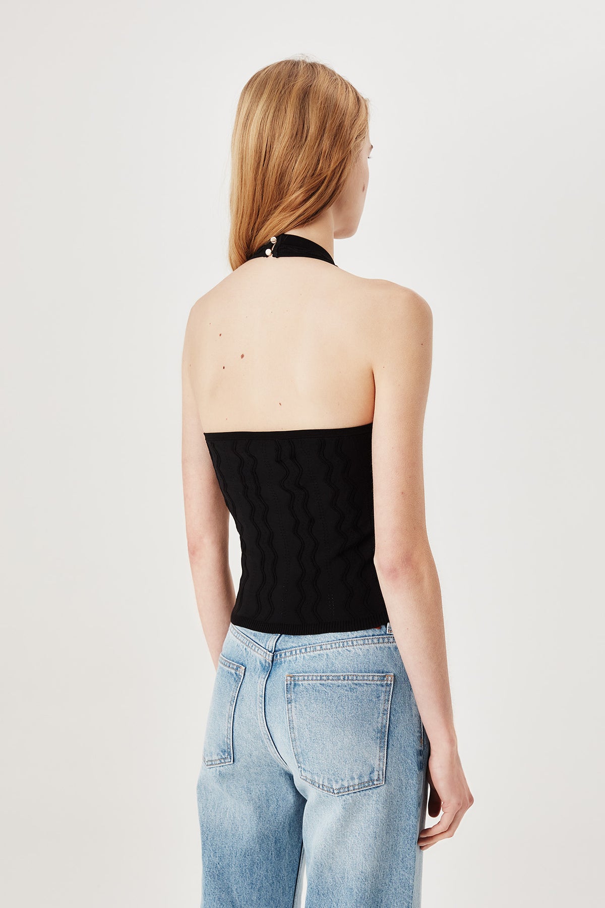 Top dos nu en maille