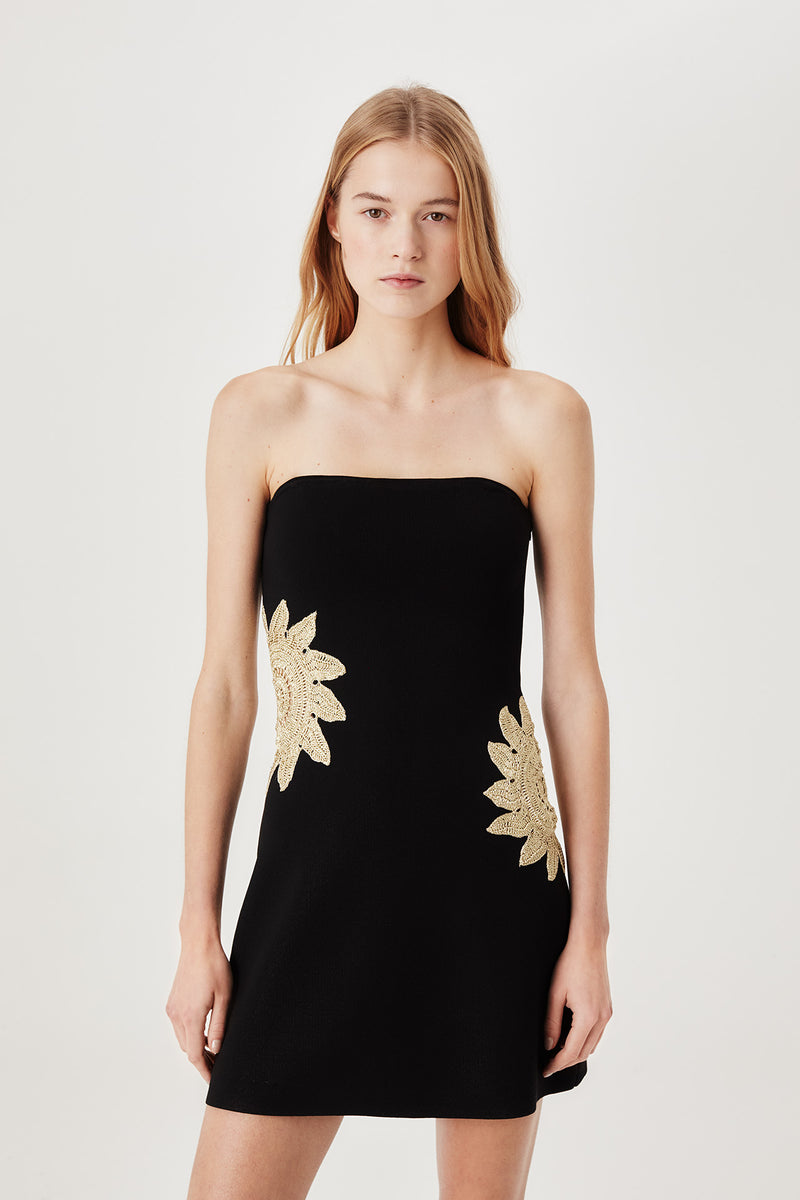 Short knit dress with openwork sunburst detailing