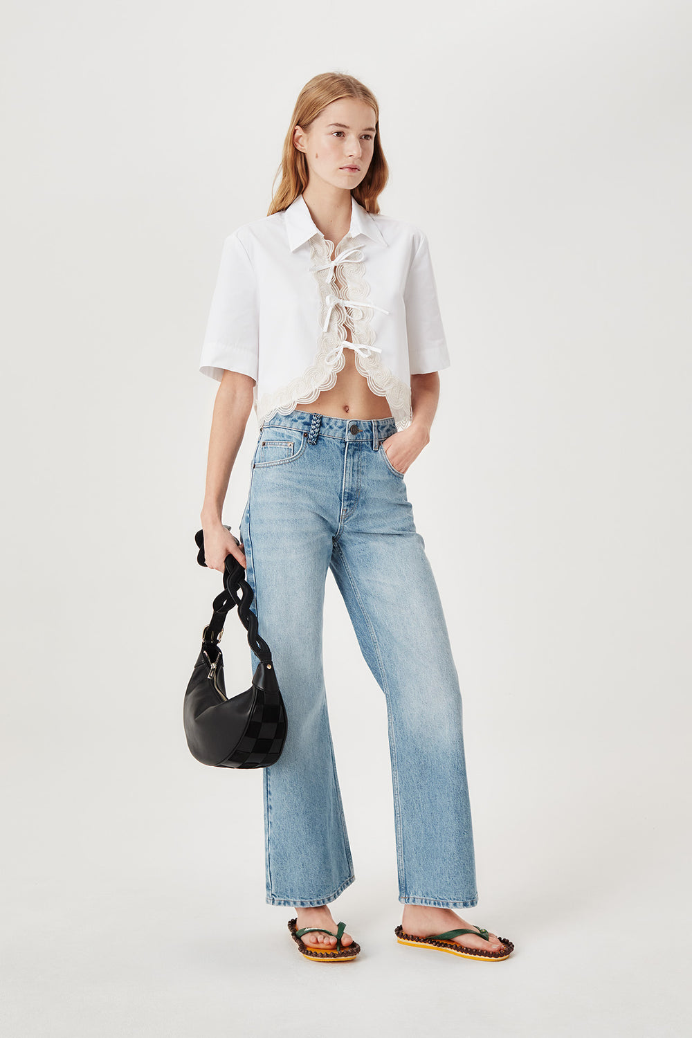 Two-material checkerboard pattern shoulder bag