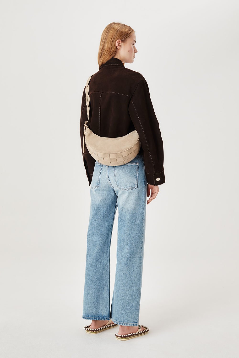 Two-material checkerboard pattern shoulder bag