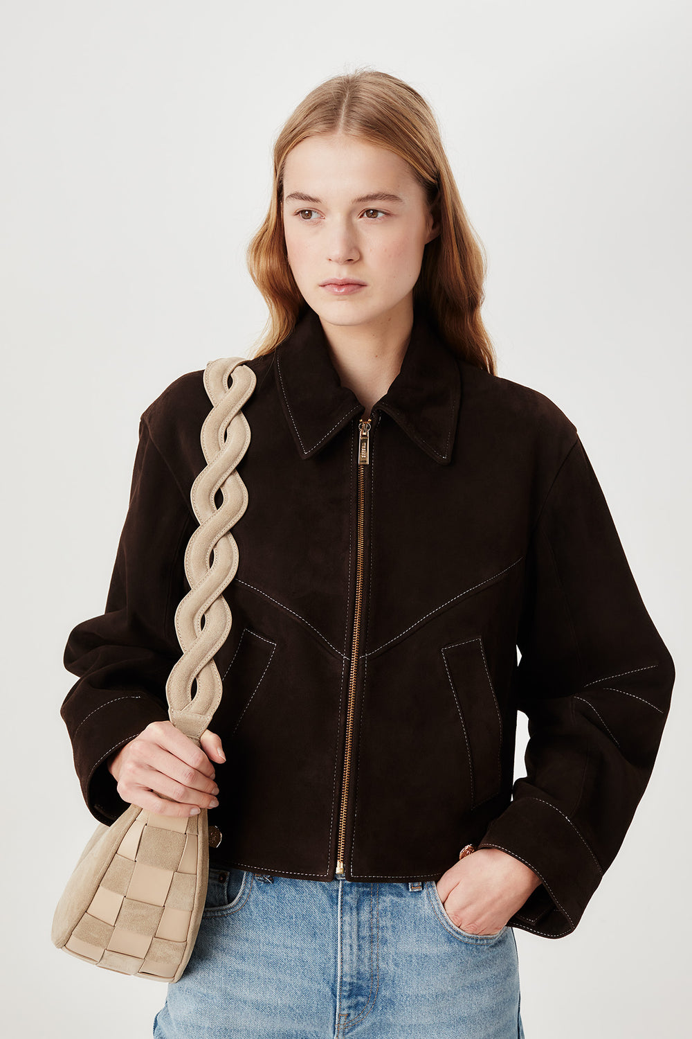 Two-material checkerboard pattern shoulder bag