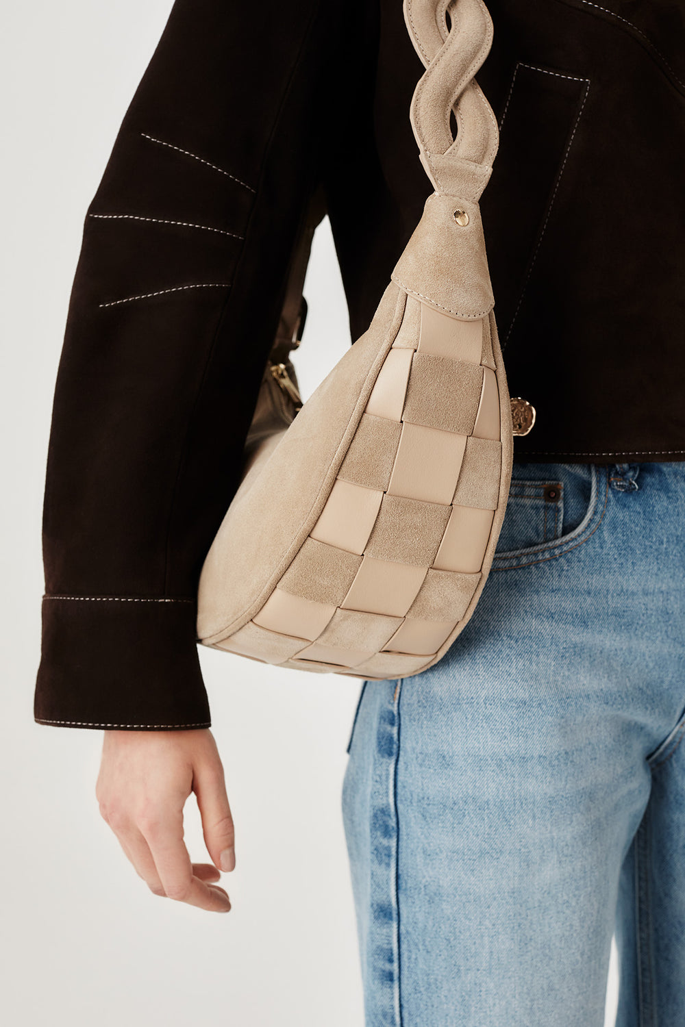 Two-material checkerboard pattern shoulder bag
