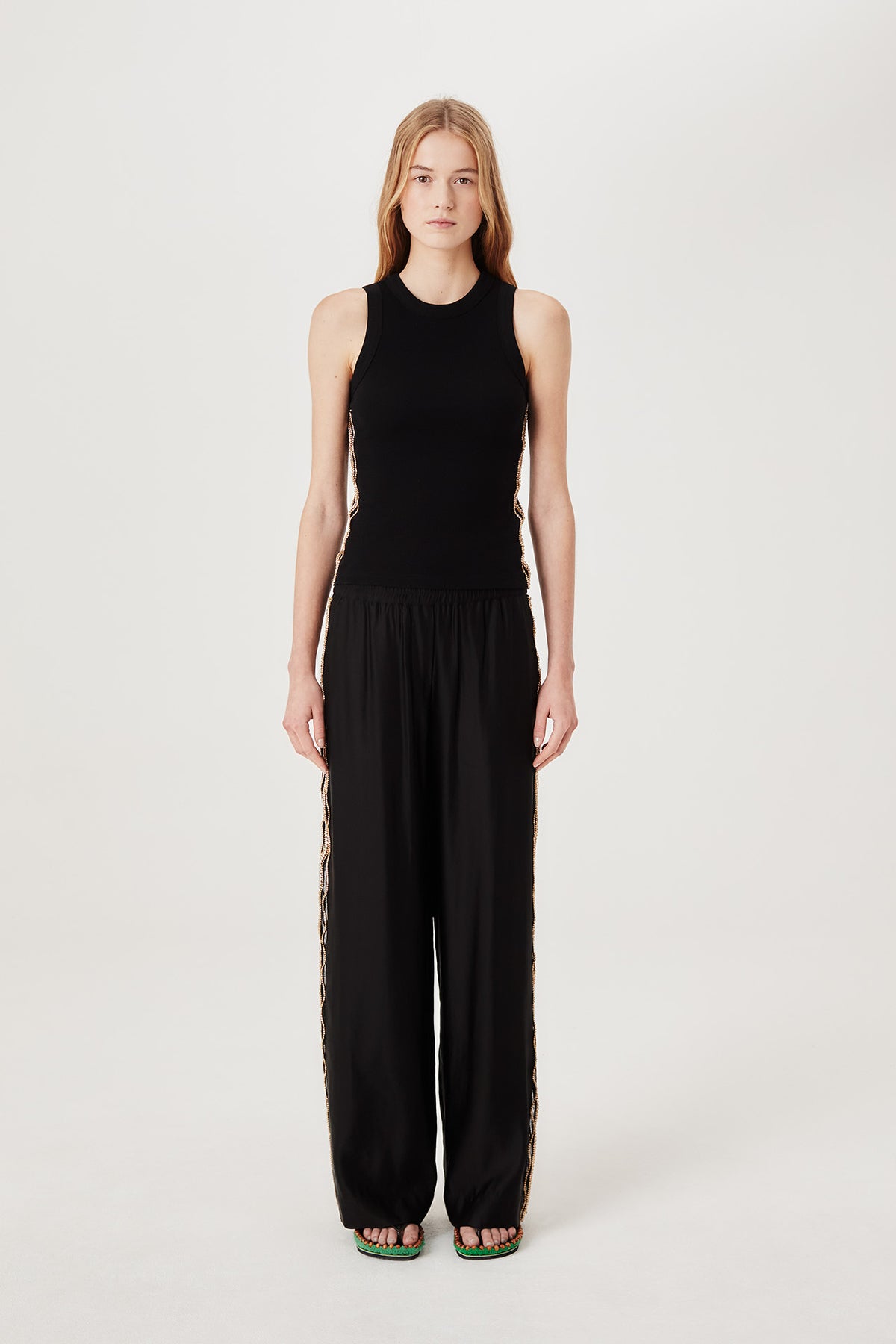 Pants with embroidered rhinestones