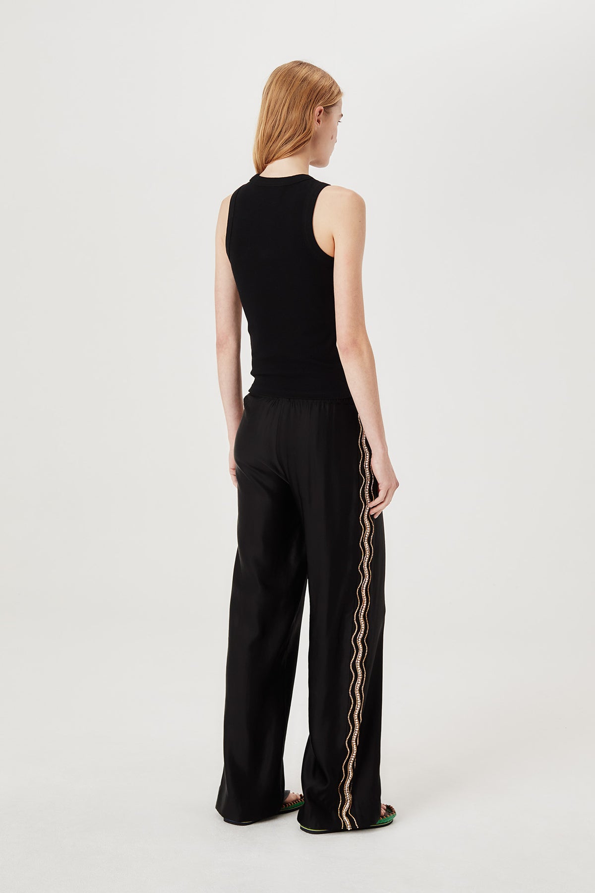 Pants with embroidered rhinestones