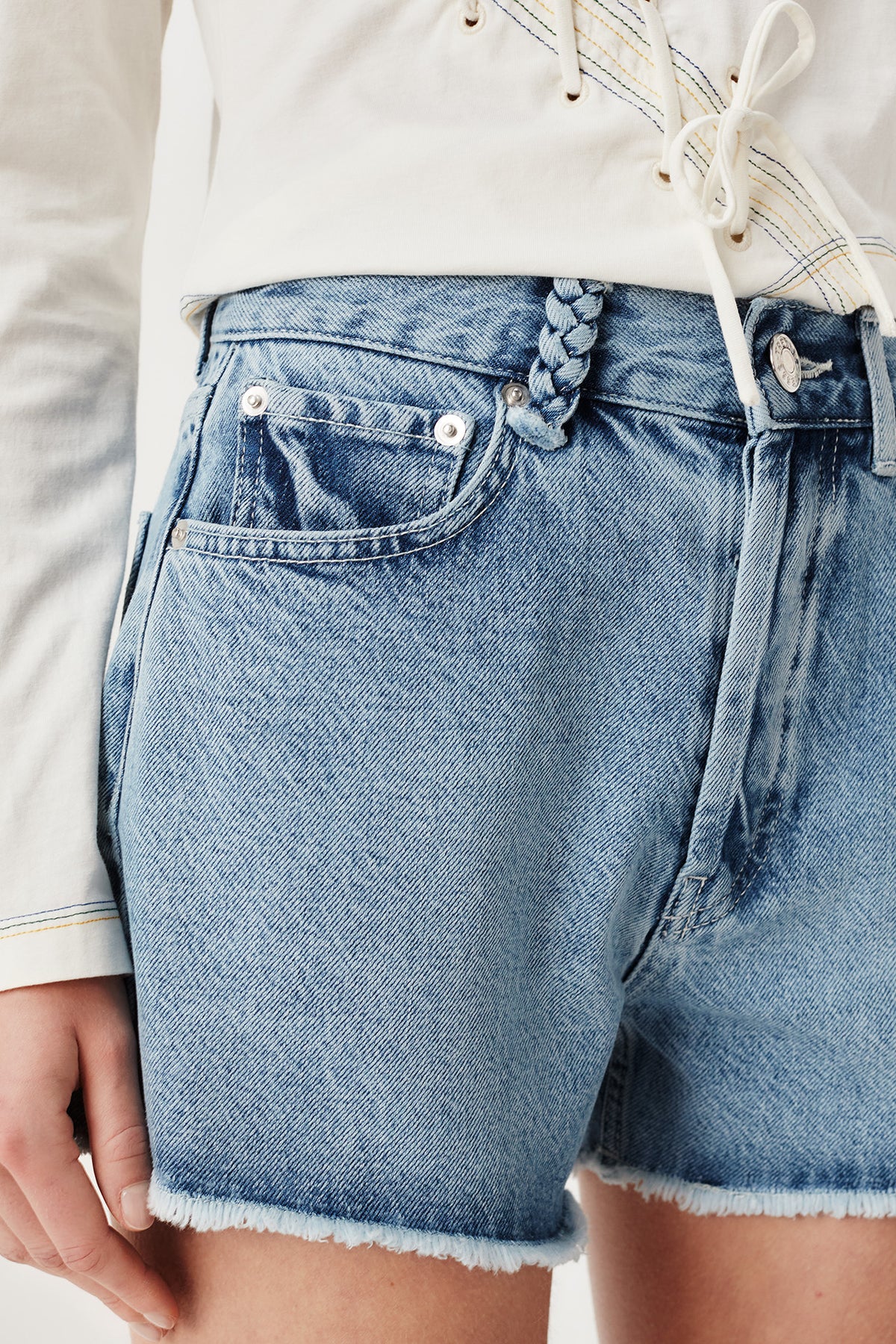 Shorts with embroidered pockets