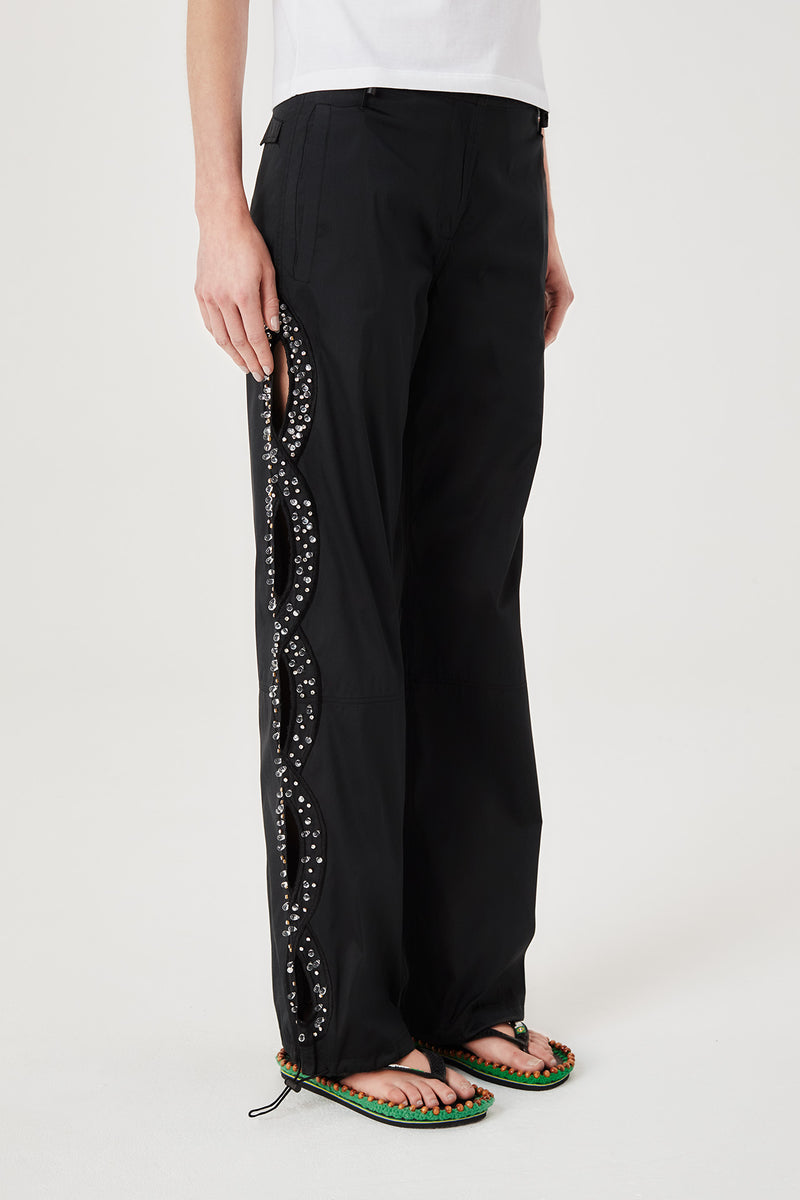 Pantalon à tresses brodées de strass