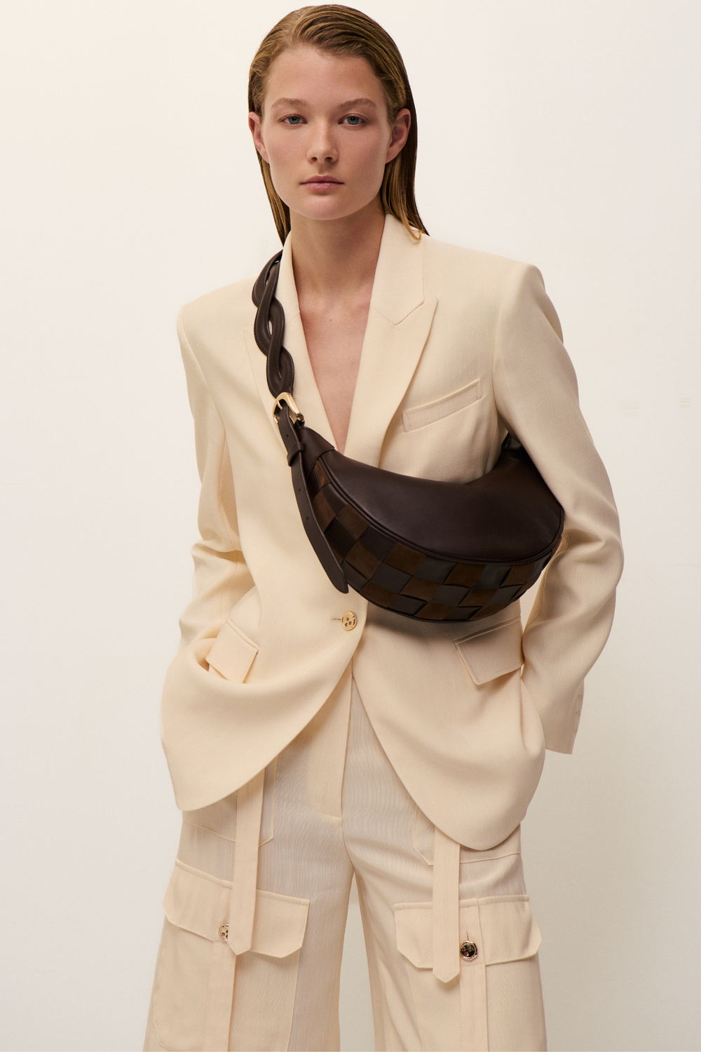 Two-material checkerboard pattern shoulder bag