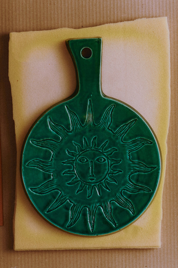 Sun-patterned cutting board