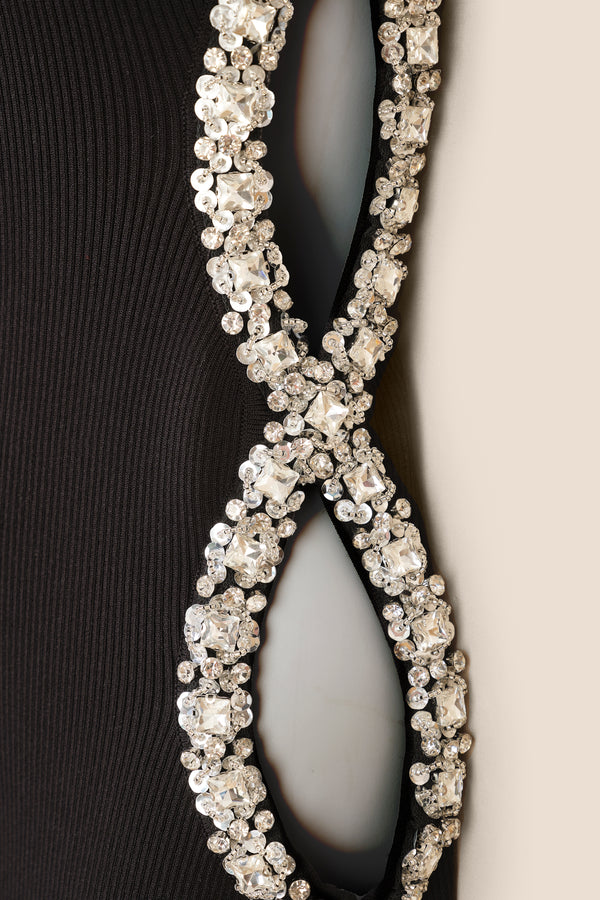Dress with rhinestone openings