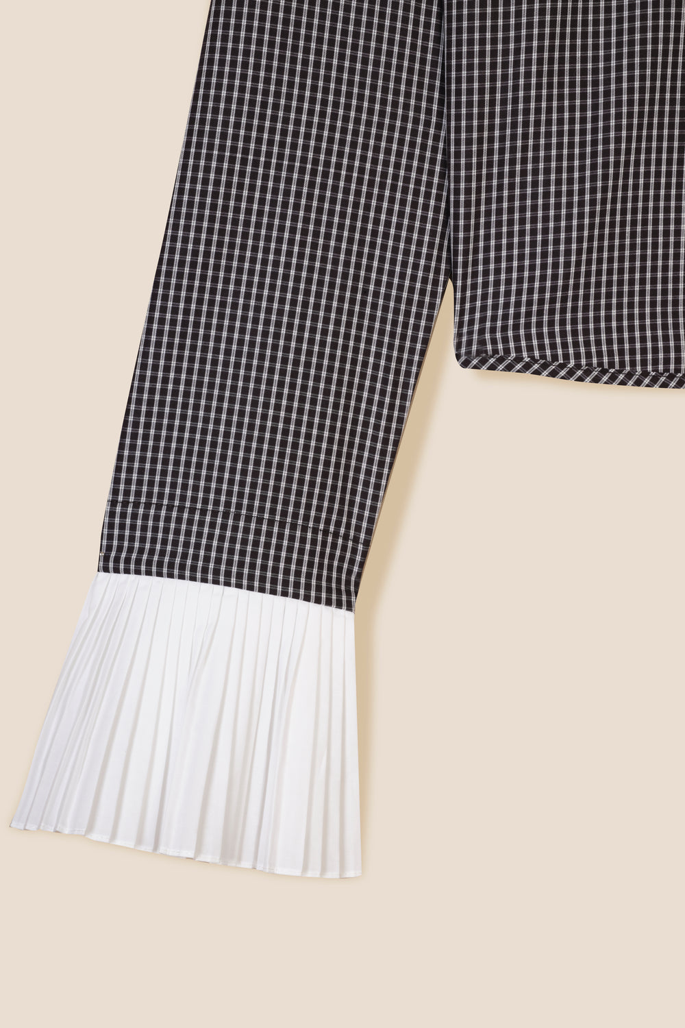Shirt with pleated cuffs