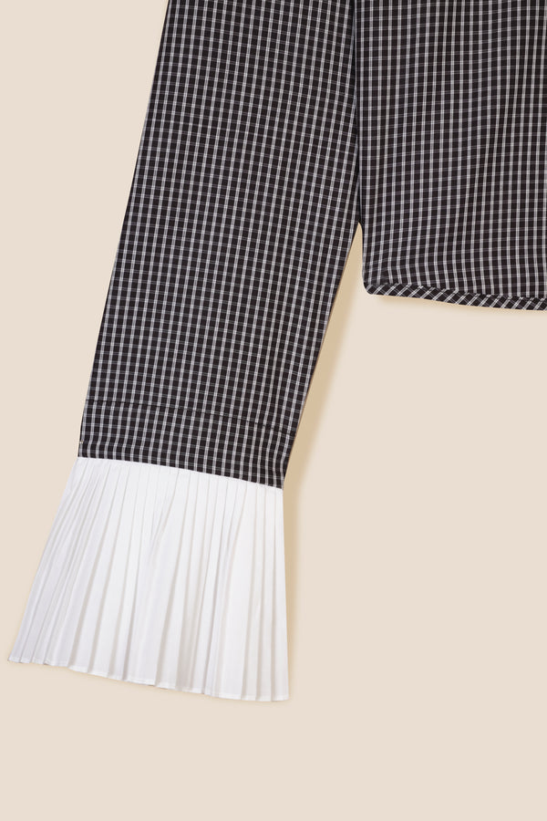 Shirt with pleated cuffs