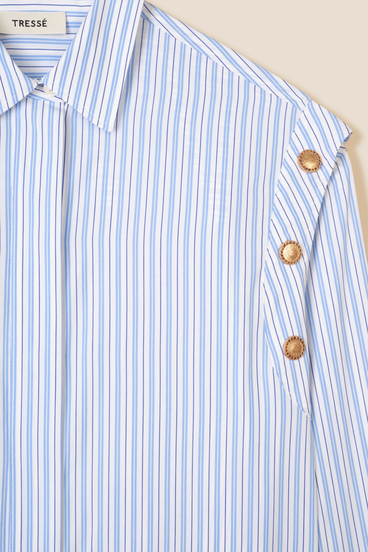Striped shirt with snap buttons