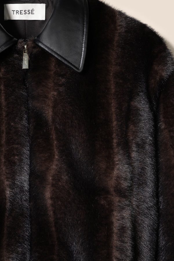Fur with leather collar