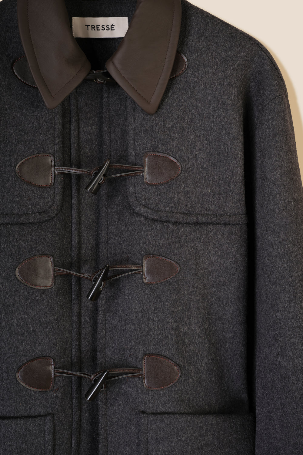 Duffle coat with leather collar