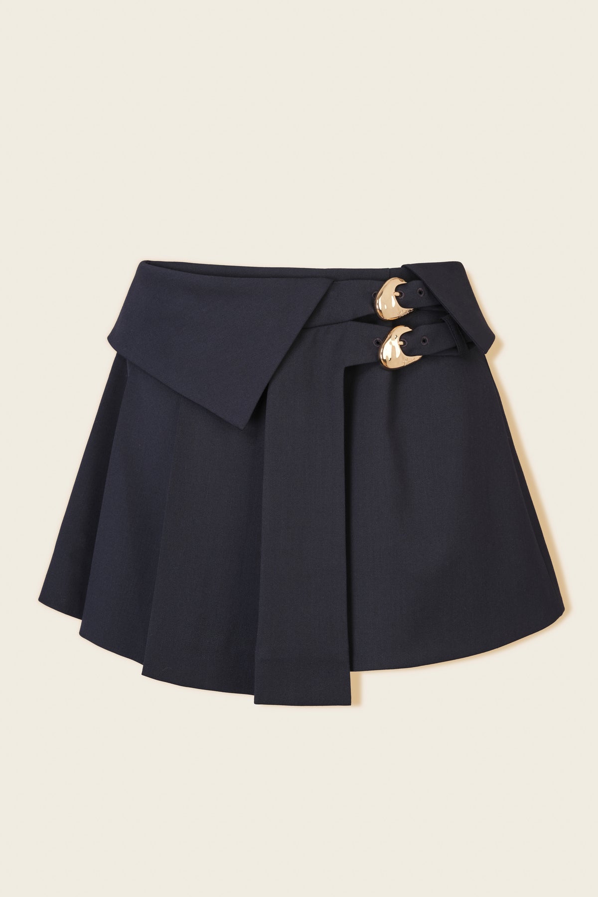 Jupe courte plissée à boucles