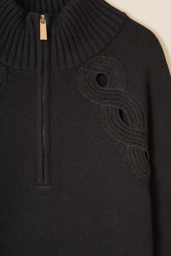 Braided opening sweater
