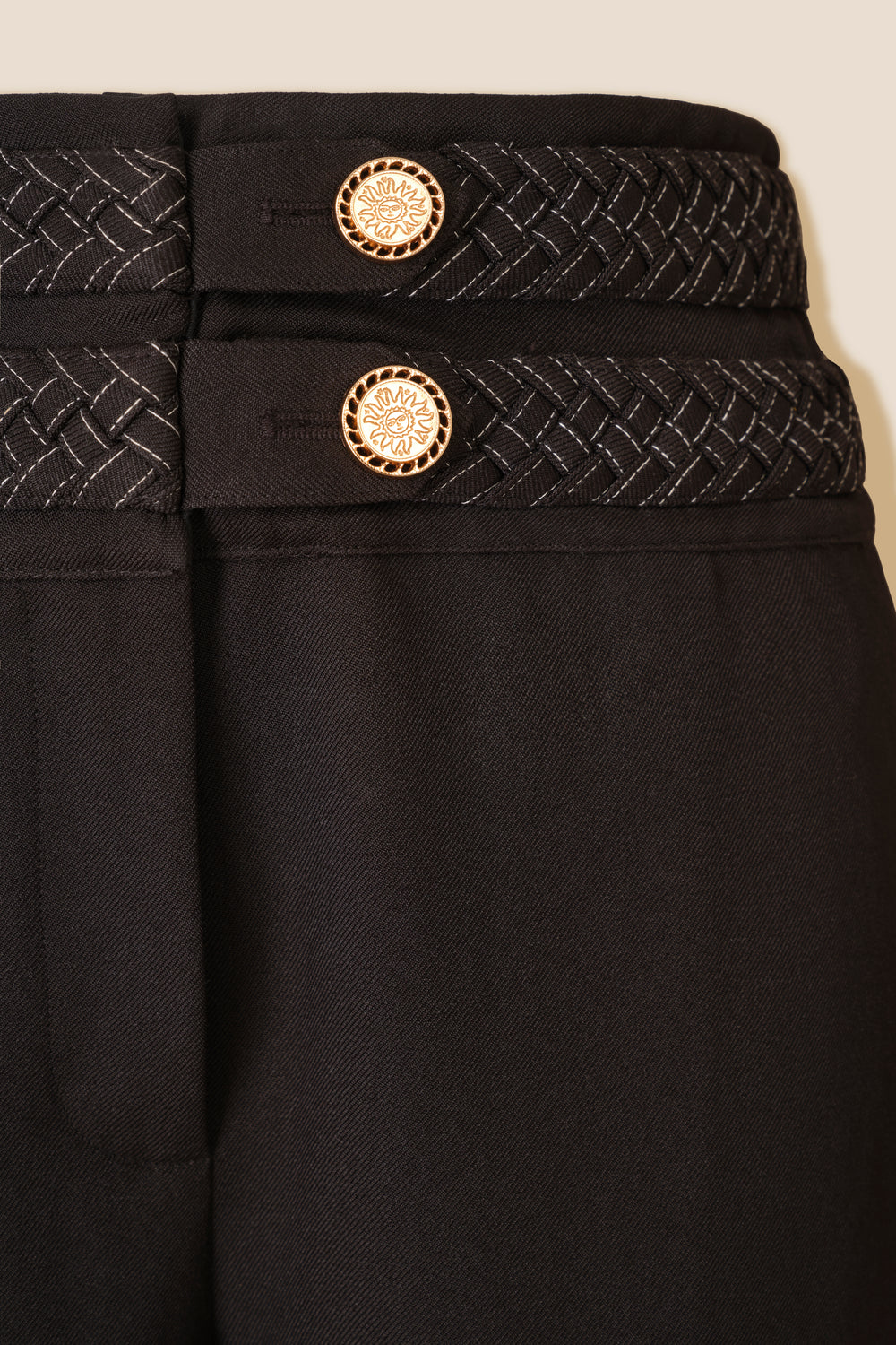 Pants with braided belt