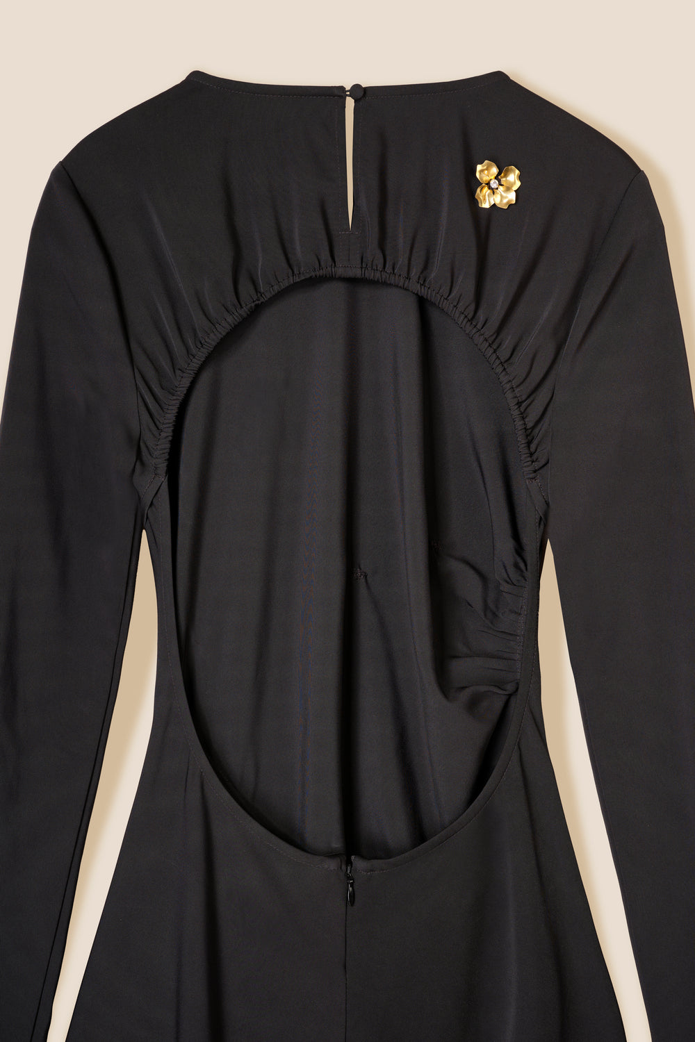 Long dress decorated with golden flowers