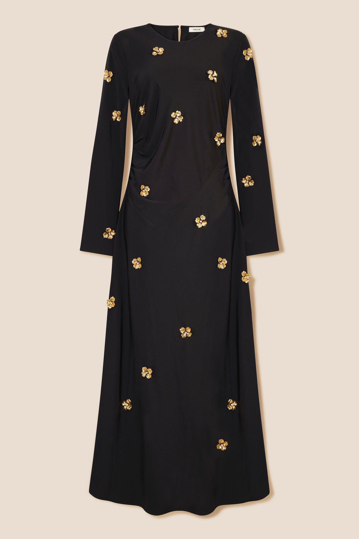 Long dress adorned with gilded flowers