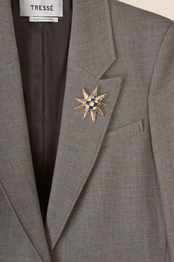 Tailored jacket with brooch
