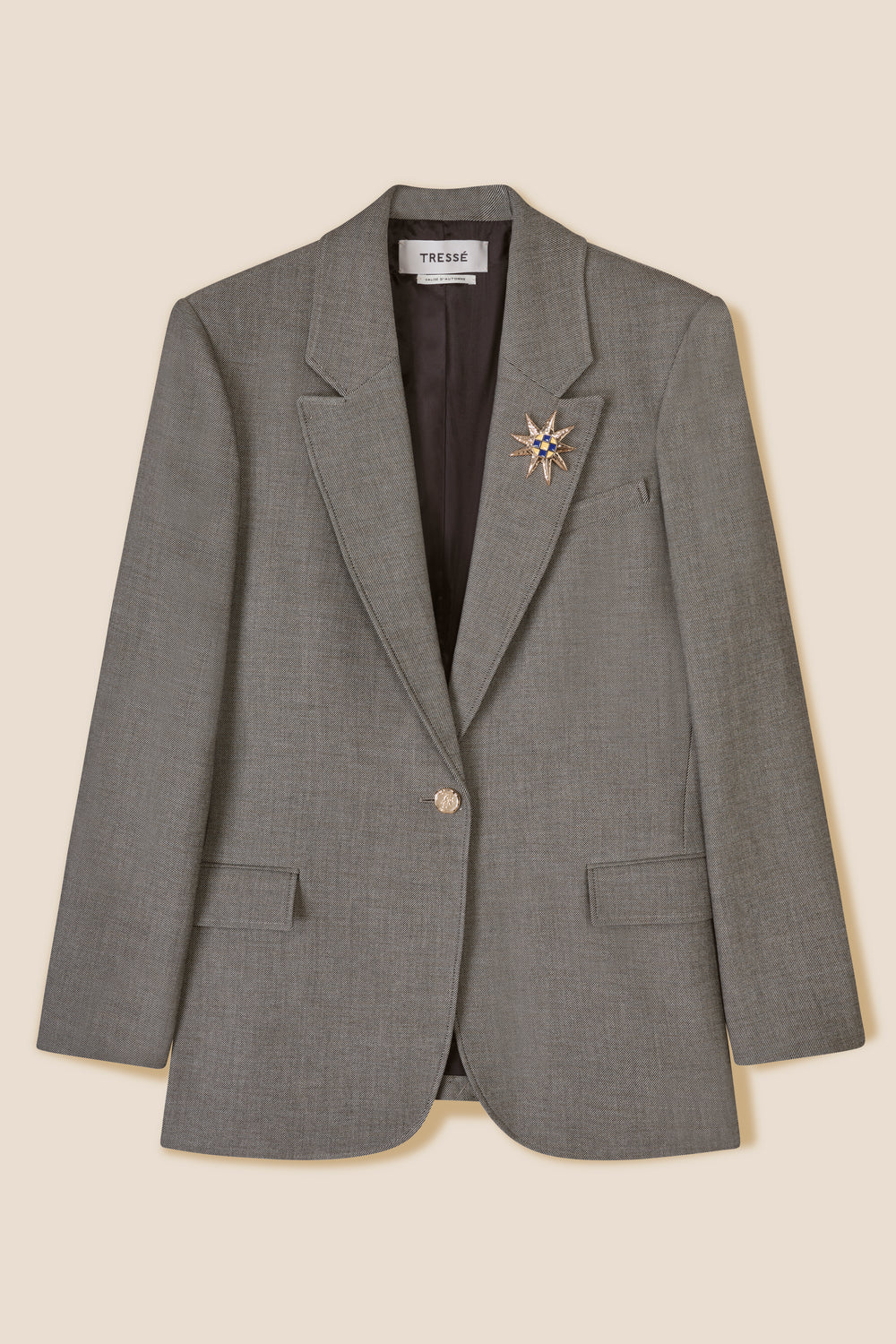Tailored jacket with brooch