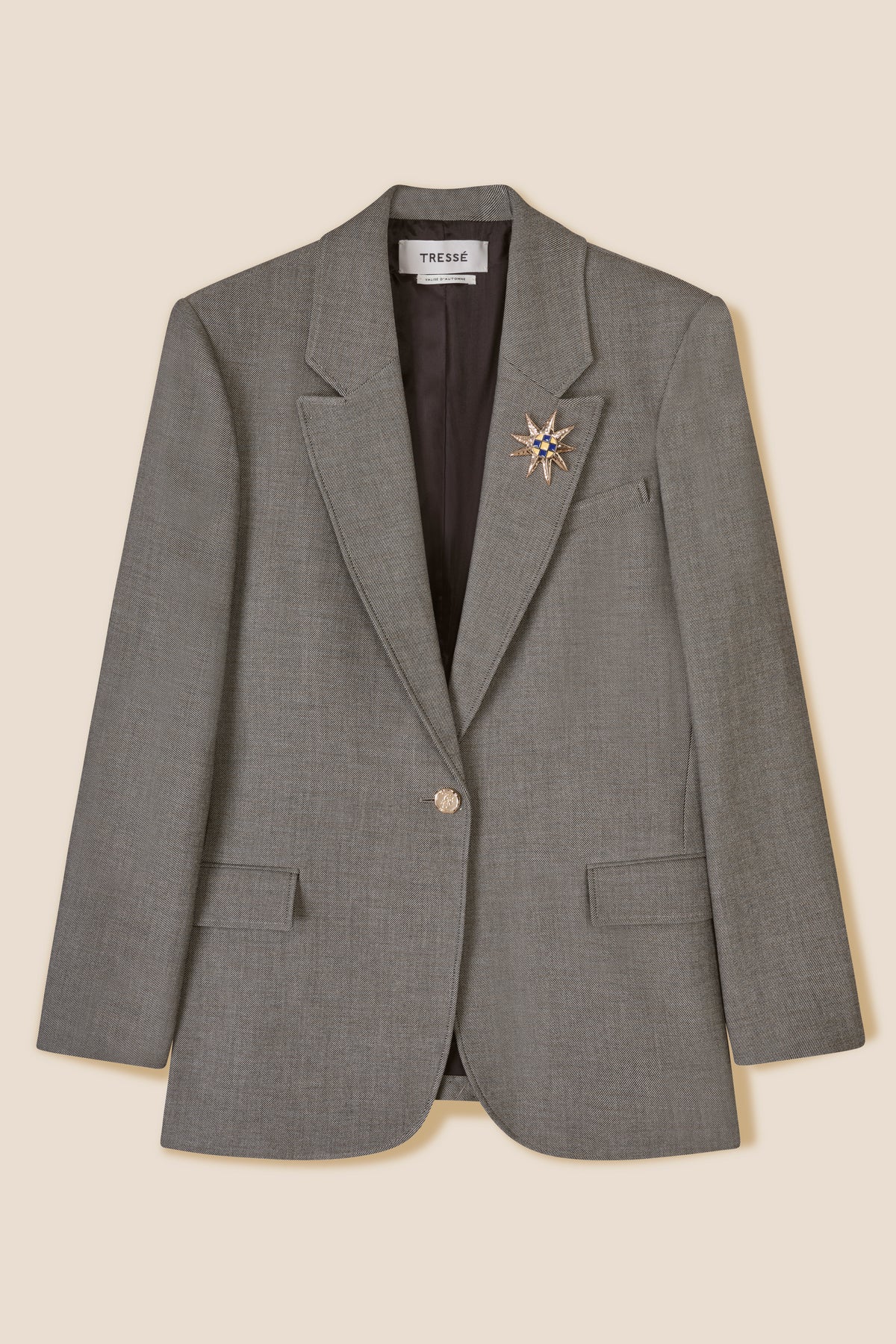Tailored jacket with brooch