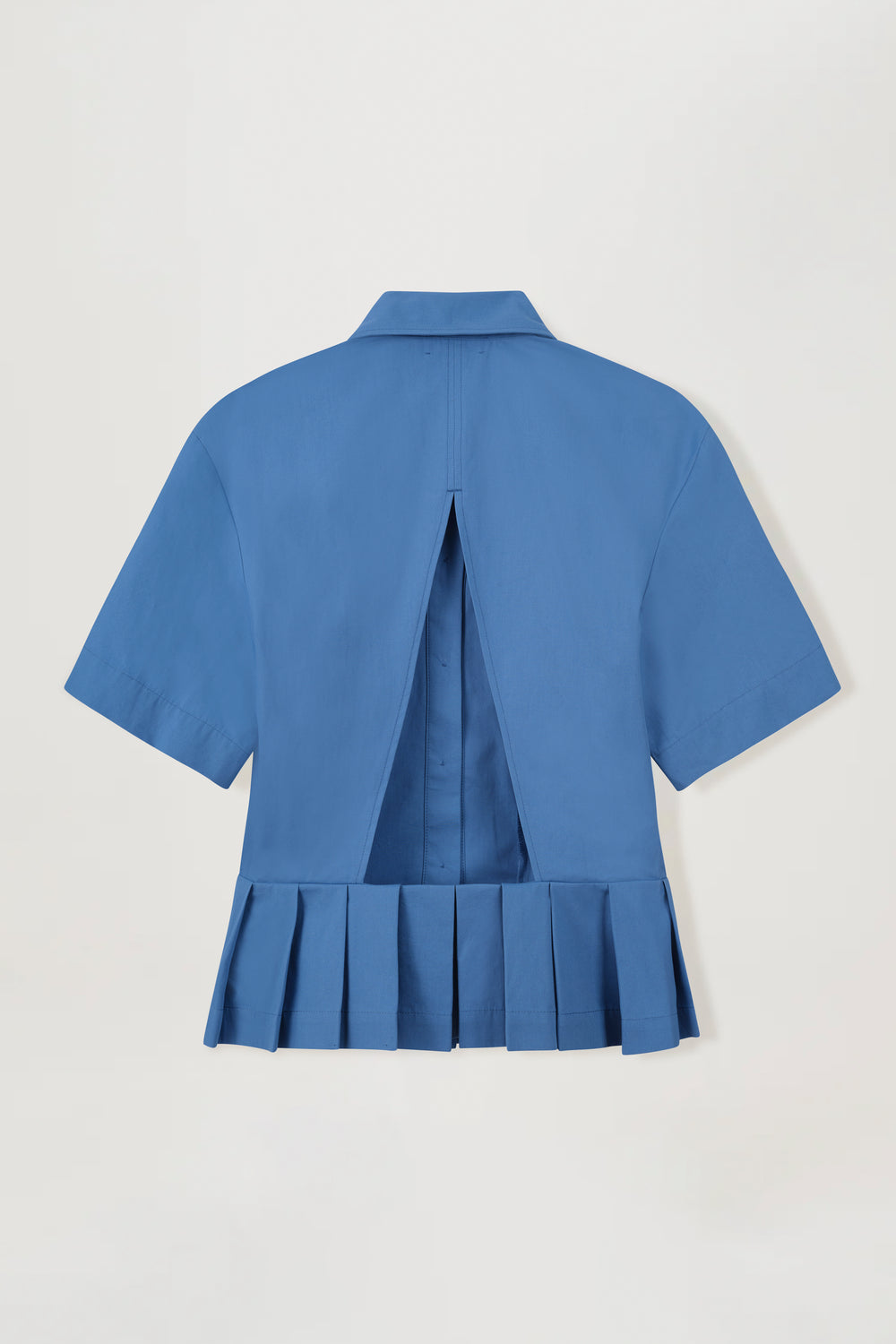 Chemise courte à dos nu